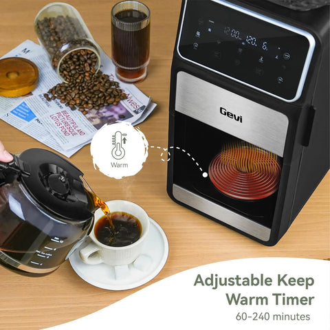 Grind And Brew 10-Cup Coffee Maker With Built-In Burr Grinder, programmable touchscreen, and glass carafe pouring coffee