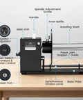 Hardcore Automatic Label Rewinder Machine Handles Coreless And Up To 1.1 Inch Cored Rolls showing detailed components on a wooden table.