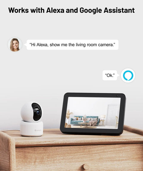 2K Indoor Security Cam With 360 Degree View For Pets And Baby, Night Vision, Built In Siren on a table next to smart screen