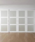 Top Shelf White Sliding Closet Door Kit For 128 By 80 Inch Openings featuring four smooth gliding panels, white PVC and frosted glass.