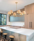 39 Inch Boho Rattan Chandelier With Six Warm Bulbs Hits Different On Your Kitchen Island Dining Table Or Living Room Ceiling Using Real Natural Weave And Seamless Brass Rods Built Big Time Safe Through UL Certification in modern kitchen setting.