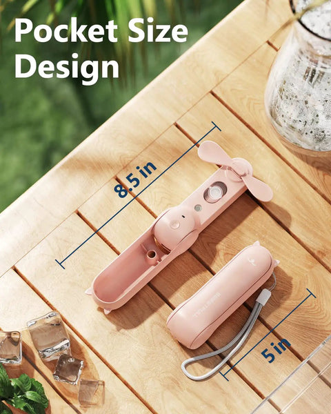 Portable Misting Fan With 15ml Water Tank Handheld Personal Mister Rechargeable Mini Spray Fan For Travel Outdoors Hiking Camping Home Office Pink One Touch Mist On Off shown opened and closed on table