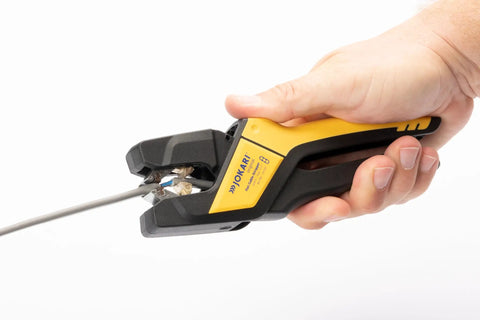 Hand using Ergonomic Automatic Flat Cable Stripper For PVC Insulated Cables, Slick External Sheathing And Clean Internal Insulation Removal