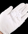 Set Of 50 Plastic Gears 8 Teeth Model 082A Reduction Gear Worm Gears For RC Car And Robot Motors in a gloved hand