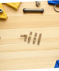Small Solid Brass Invisible Barrel Hinges for Jewelry Boxes and Cabinet Doors on a wooden surface