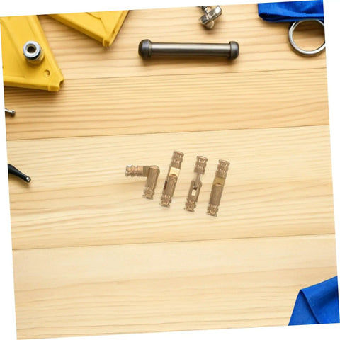 Small Solid Brass Invisible Barrel Hinges for Jewelry Boxes and Cabinet Doors on a wooden surface