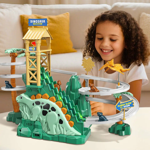 Child playing with Dinosaur Climbing Slide Toy With Racing Track For Toddlers 3 4 5 6 7 8 Light Up Music Themed Car Track Set