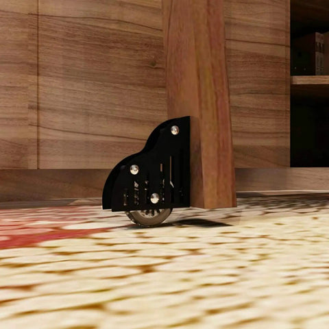 Built Tough Sliding Barn Door Track Kit With Rust Proof Extension Rail And Quiet Floor Roller For Quick Home Or Library Setup Smooth Glide Motion Reliable Structure Handles Three Hundred Thirty Pounds, showing black floor roller under wooden furniture.