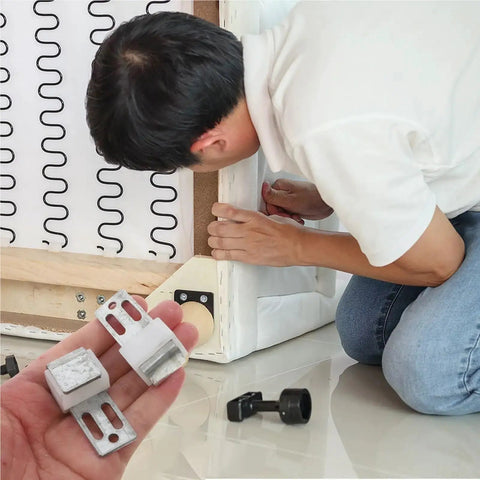 Kick Those Nagging Squeaks To The Curb With These 50 Pack Iron Hook Buckles And Sectional Connectors being installed on a couch.