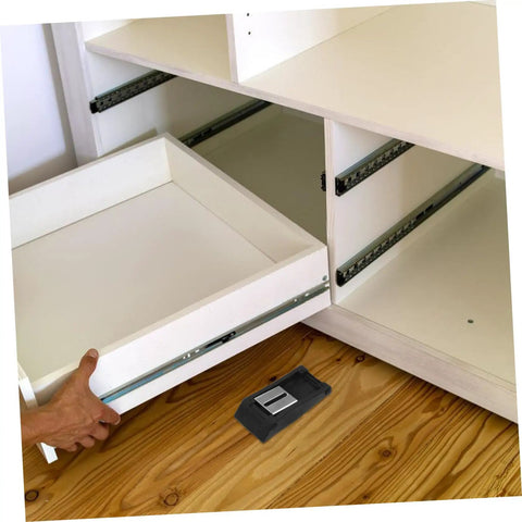 Two Pack Rubber Toggle Latches With Noise Reduction placed in front of cabinets for installation, showing durable construction.