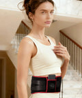 Woman wearing Cordless Heating Massage Belt With 3 Heat Settings And 5 Vibration Modes 10000mAh Rechargeable Battery Portable Back Massager