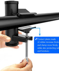 Outdoor Umbrella Clamp Heavy Duty Stainless Steel Deck Mount in use on black railing with adjustable arm and rubber contact plates.