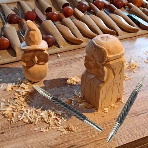 Dual Head Hammerless Nail Setter And 3/16 In Center Punch with carved wooden figures and tools on a workbench