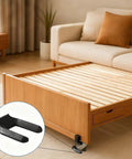 8 Pack Wheel Stoppers Set Universal Caster Cups for 50mm Bed Frames and Office Chair Wheels with a black PE stopper shown in use