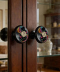 Four Pack Colorful Vinyl Record Music Sign Cabinet Knobs on wooden cupboard doors in modern home decor setting