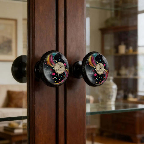 Four Pack Colorful Vinyl Record Music Sign Cabinet Knobs on wooden cupboard doors in modern home decor setting