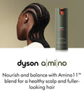 Amino11 Leave-In Scalp Bubble Treatment With Barley Grown On Farms 75mL, beside woman with braided hair.