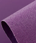 Close-up of 600 Grit Wet Dry Sanding Sheets 9 By 11 Inch Set showing textured purple surface with white fused alumina abrasive.