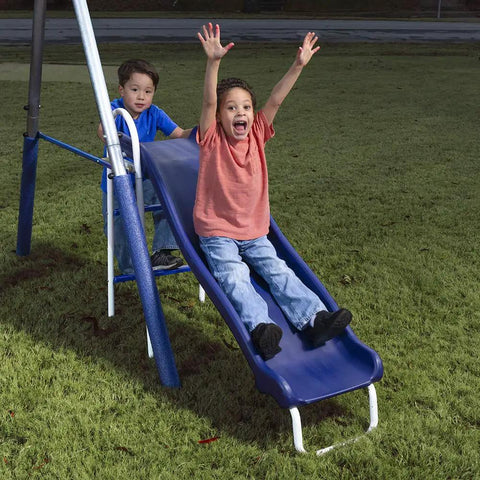 Kids playing on Five-User Four-Station Swing Set With 5 Foot Wave Slide For Kids Outdoor Backyard Metal Playground Set Easy Assembly Holds Up To 500 Lbs
