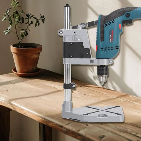 Adjustable Electric Drill Press Stand And Holder Bracket For Workbench Clamp Tool Station Lightweight Aluminum Alloy mounted on a wooden table.