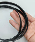 Heavy Duty Replacement Drive Belt For Stand Mixers With 125 Teeth And 375mm Length Made From Tough Rubber showing three belts in hand