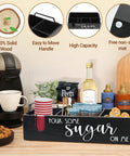 Farmhouse Coffee Bar Organizer For Countertop With Cup Holder And Pod Storage Basket Black Finish Five Compartment Coffee Station For Syrup Bottle Holder Pods And Accessories displayed with coffee pods and bottles.