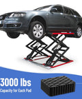 Racewill Solid Rubber Auto Lift Pads For 4 Post Car Aligners Heavy Duty 3000 Lb Capacity supporting a raised SUV on a lift.
