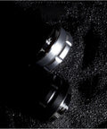 Legit Espresso Coffee Distributor Tamper For 57mm And 57.5mm Portafilters sleek convex shape on a dark surface.