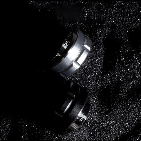 Legit Espresso Coffee Distributor Tamper For 57mm And 57.5mm Portafilters sleek convex shape on a dark surface.
