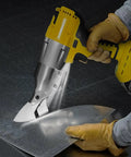 Person using Beast Of A Brushless Cordless Metal Shear With 360 Degree Rotating Head For 20V Max Battery Platforms on sheet metal