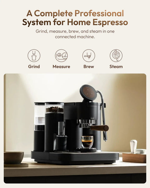 Game Changing Dual Boiler Espresso Machine With Integrated Precision Grinder And Dual Weight Sensors For Reliable Shot Prep And Silky Steamed Milk Anytime You Want To Chill And Sip, sleek black design on a modern kitchen counter.