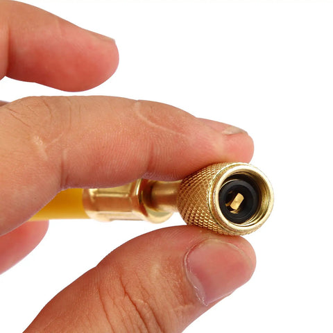 Close-up of gold connector for 3 Piece AC Manifold Gauge Hose Kit For R134A R404A R12 R502 With One Quarter Inch Threads