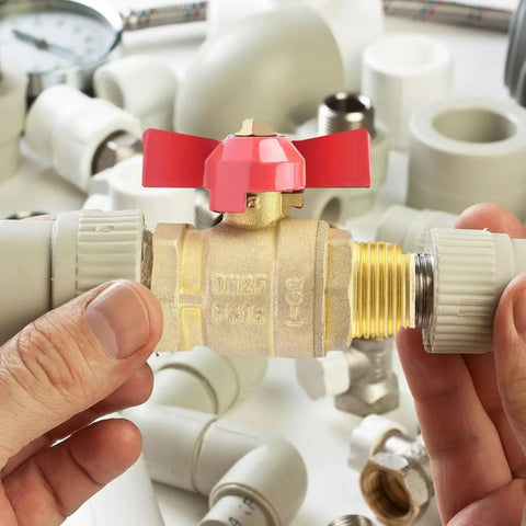 Leak Proof Heavy Duty Three Quarter Inch Brass Ball Valve With Built Different Construction And Smooth Flow Control For Yard Projects Car Wash Plumbing Corrosion Resistant Setup with red handle in hand.