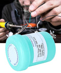 Pro Grade No Clean Flux Paste For PCB Rework And Soldering, soldering technician using 559 NC flux paste, 100g tin in view.