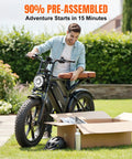 Man assembling Powerful Electric Bike For Adults With 1500W Peak Motor And 60 To 80 Mile Range, 20 Inch Fat Tire, in garden