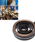 Spring Return Coil for Drill Press, 19 mm Width, 64 mm Outer Diameter, Durable Spring Steel, adjacent to a drilling machine