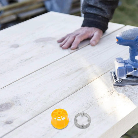 Hand using Heavy Duty 1/2 And 3/4 Inch Pipe Threader Kit For Water Pipes on wooden surface with electric drill adapter and dies.