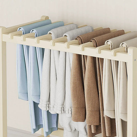 Top Shelf Rolling Clothes Rack Featuring Heavy Duty Swivel Wheels And Sturdy Natural Wood Slats Designed For Effortless Trouser Storage Within Any Spacious Bedroom Or Small Living Area