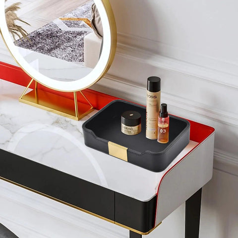 Lux Leather Valet Tray Desk Organizer And Nightstand Catchall Caddy on vanity with cosmetics, black leather, water-resistant