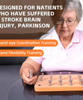 Premium Wooden Finger Pegboard For Adults Hand Therapy And Fine Motor Skill Rehab Top Notch Occupational Therapy Tool With Durable Splinter Free Design For Safe Long Term Stroke Rehab used by older adult for training.