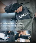 Person placing a small deflated black Bi Color 20W Inflatable LED Tube Light For On The Go Filming Portable Handheld Magnetic Mount into a pocket.