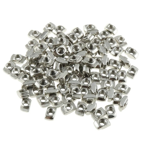 Heavy Duty M4 T Slot Nuts Set 100 Pieces Nickel Plated Carbon Steel Half Round Sliding Fasteners For 2020 Series Aluminum Extrusion Profiles And DIY Projects Built To Last shown in a pile