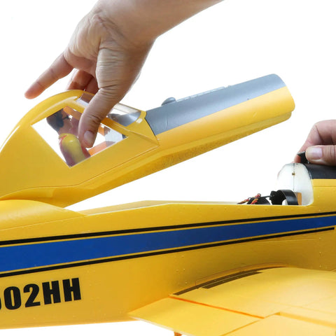 Hands assembling canopy on Air Tractor 1.5m RC Plane BNF Basic With AS3X Safe Select Easy To Fly No-Brainer For Beginners Scale Crop Duster