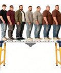 Seven men standing in a line on a Built Like A Tank Adjustable Height Rolling Welding Table With Thick Carbon Steel Plate.