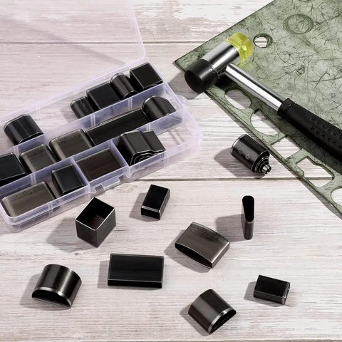 52 Shapes Leather Hole Punch Tool Set with Cutter and Carving Hammer displayed on a table with various punch shapes and open case.
