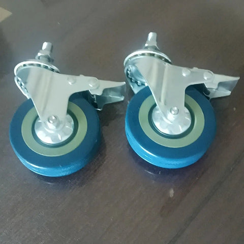 Heavy Duty Swivel Caster Wheels With Locking Brakes Set Of Four Threaded Stem Quiet Rubber Units For Carts And Furniture, close-up view.