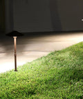 3W Low Voltage Landscape Path Lights 12V Bronze Outdoor Garden Yard Waterproof With Replaceable G4 LED Bulbs illuminating lawn at night