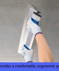 Person using Pro Grade Drywall Skimming Blade Set With Extension Handle For Mud Finishing, ergonomic grip shown