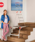 Aluminum Staircase Platform With Height Adjustable Telescopic Rails And Feet in use on wooden staircase with a woman standing.