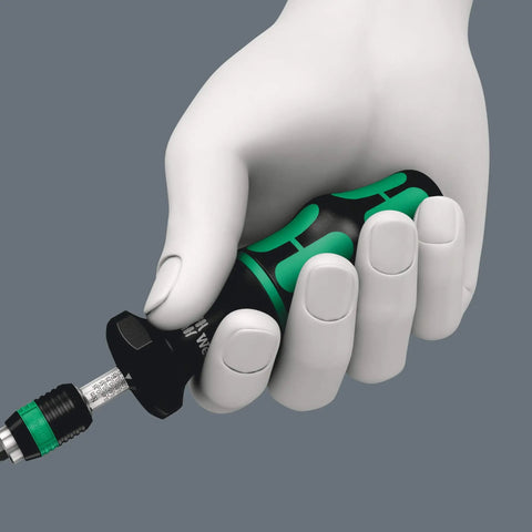 Close-up of a hand holding a Kraftform Series 7400 Adjustable Torque Screwdriver with Rapidaptor Quick Release Chuck 0.1 to 3.0 Nm.